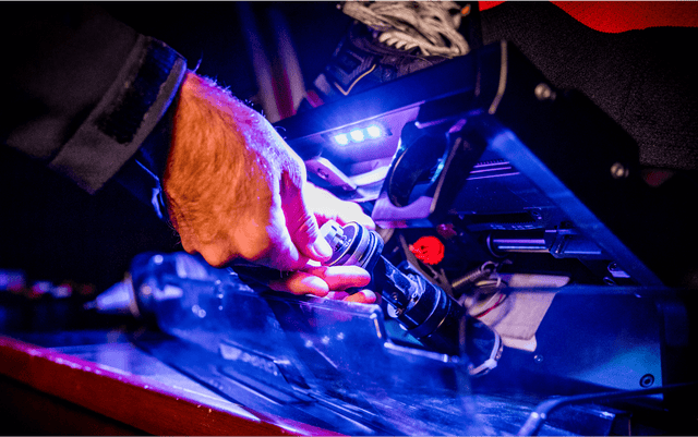 Image of a hand replacing a Sparx Grinding RIng